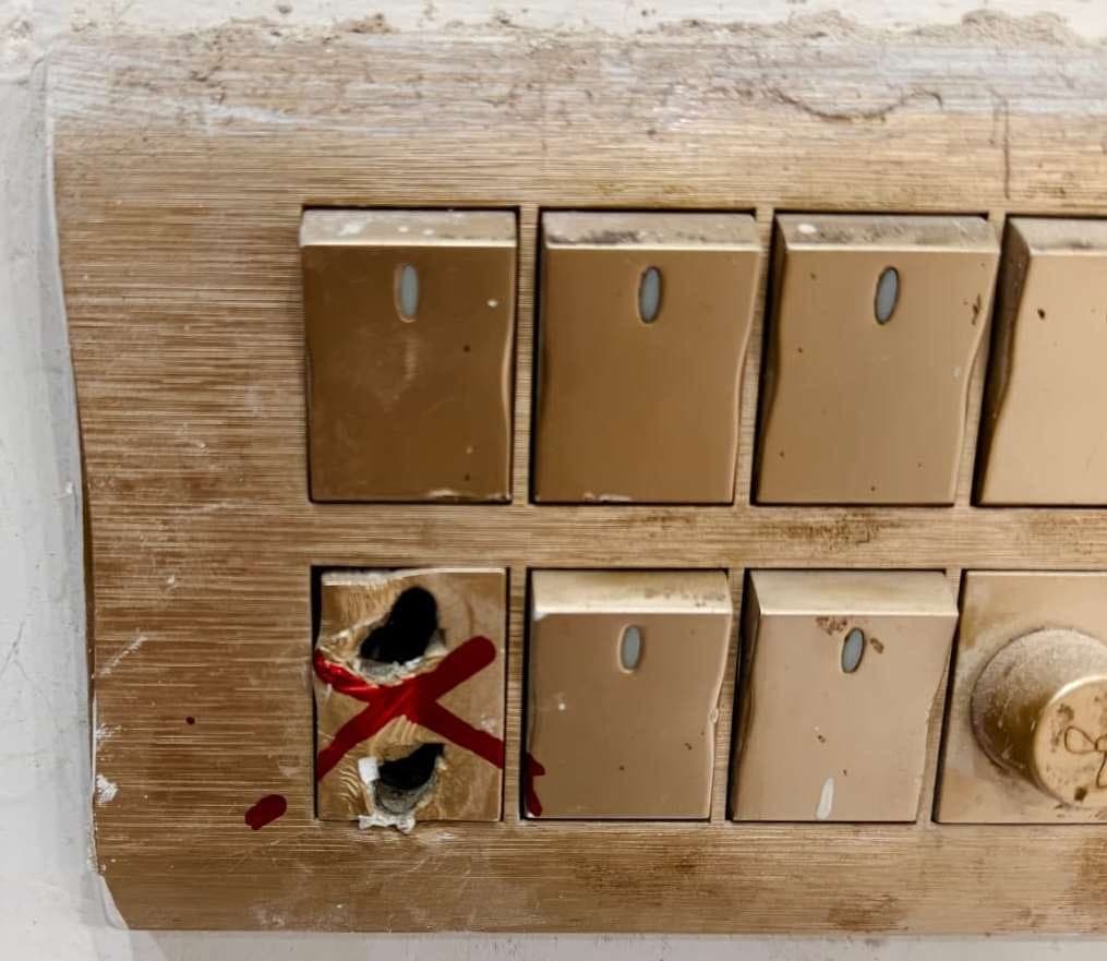 Broken socket with live-wire risk: Ground floor