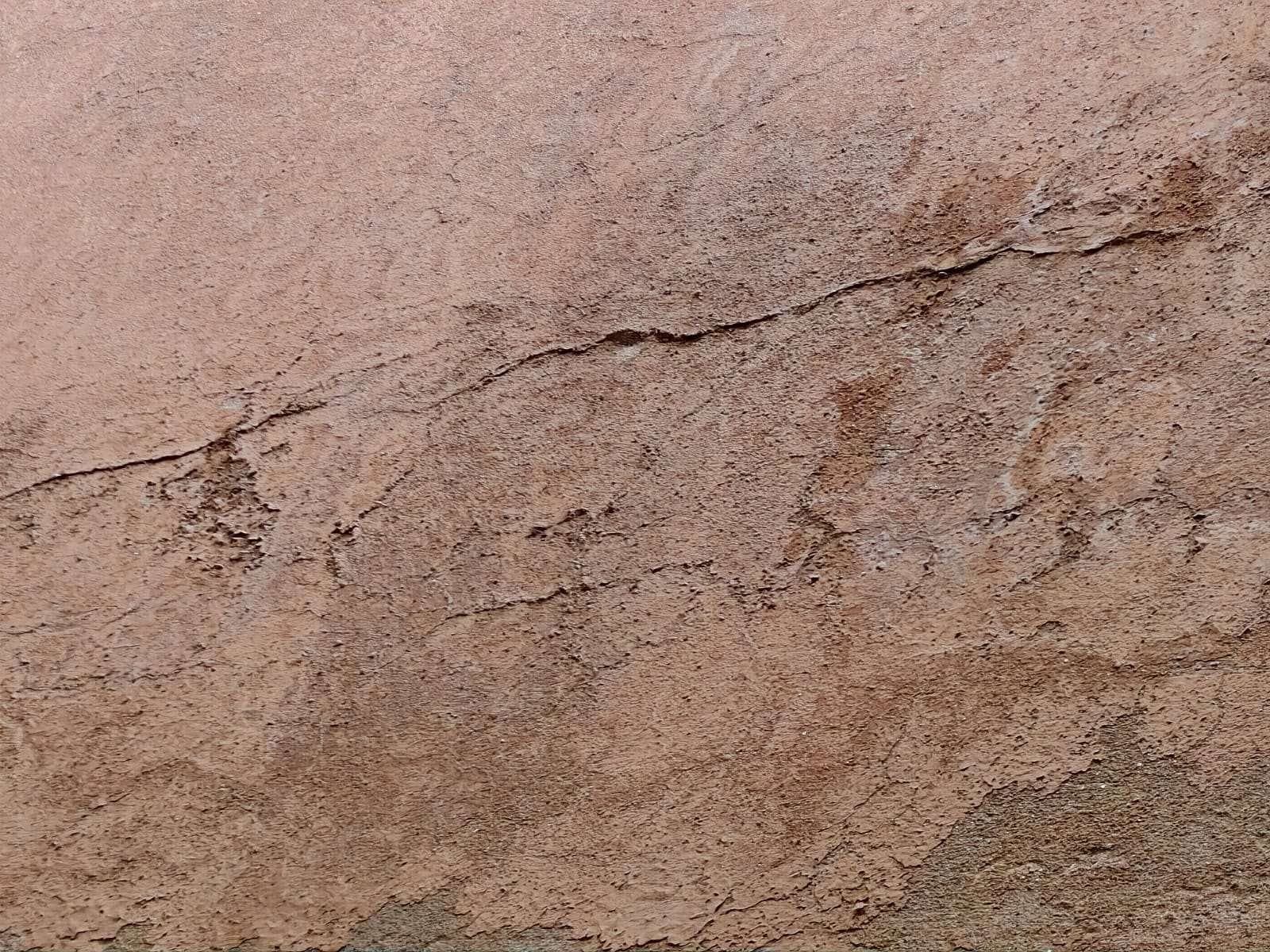 Hairline crack: First floor, below the front window